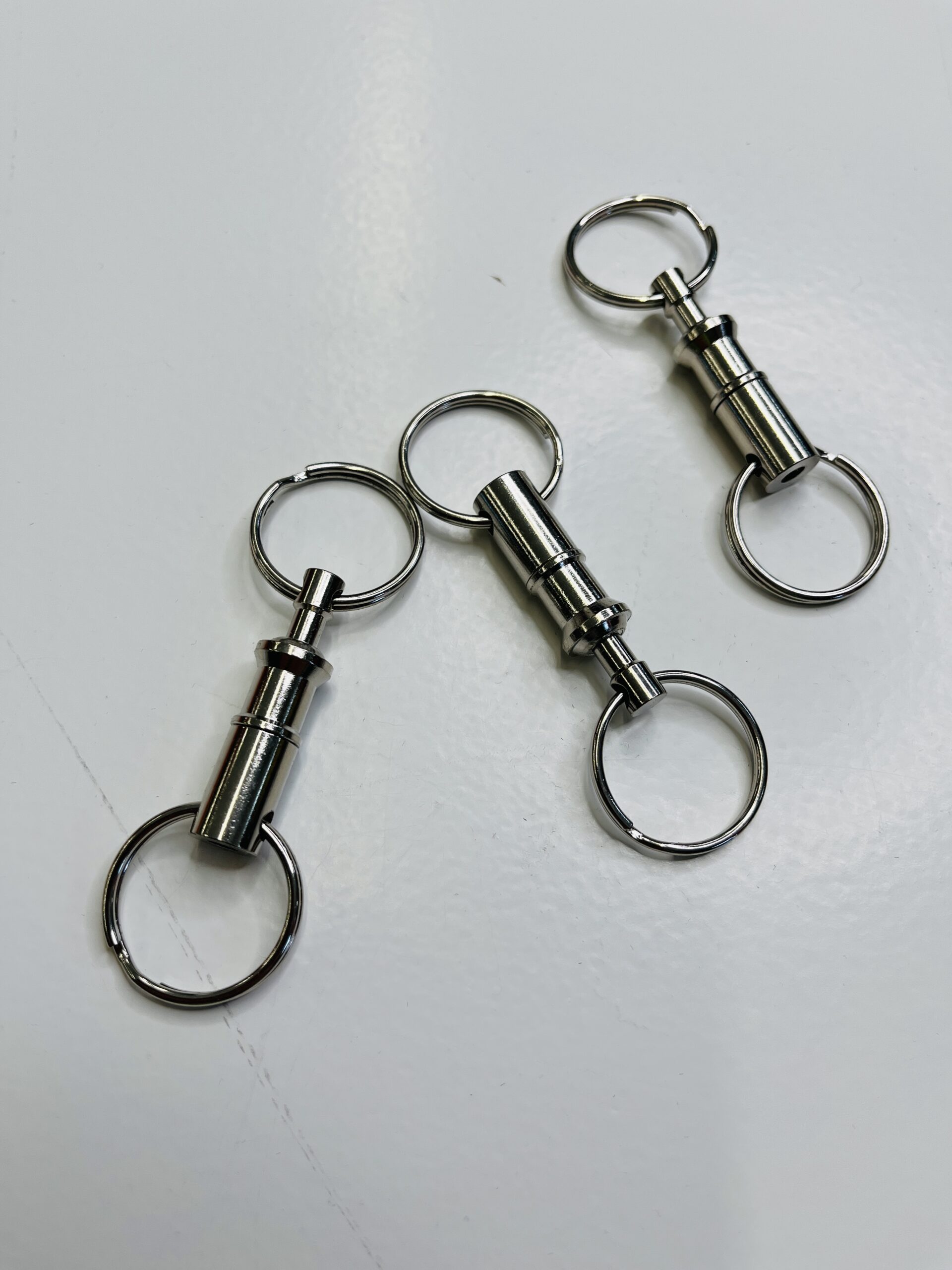 Nøglering - nikkel - kan deles i to - Længden 8 cm