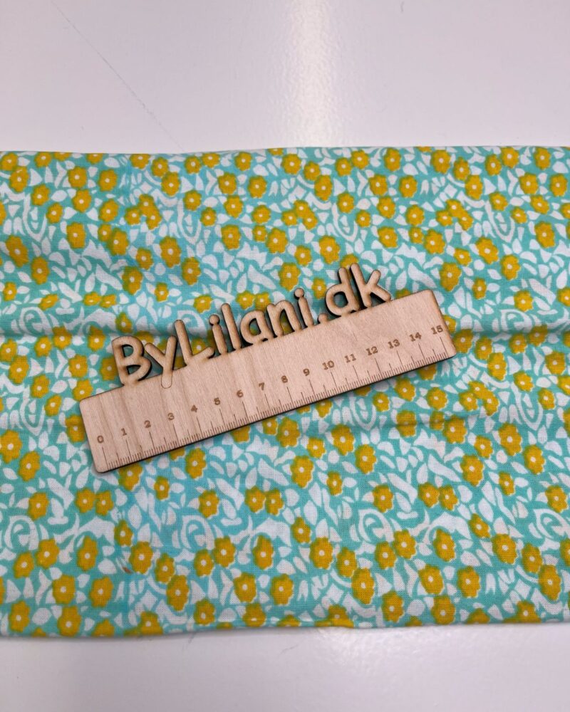 Patchwork - Gule blomster på mintblå